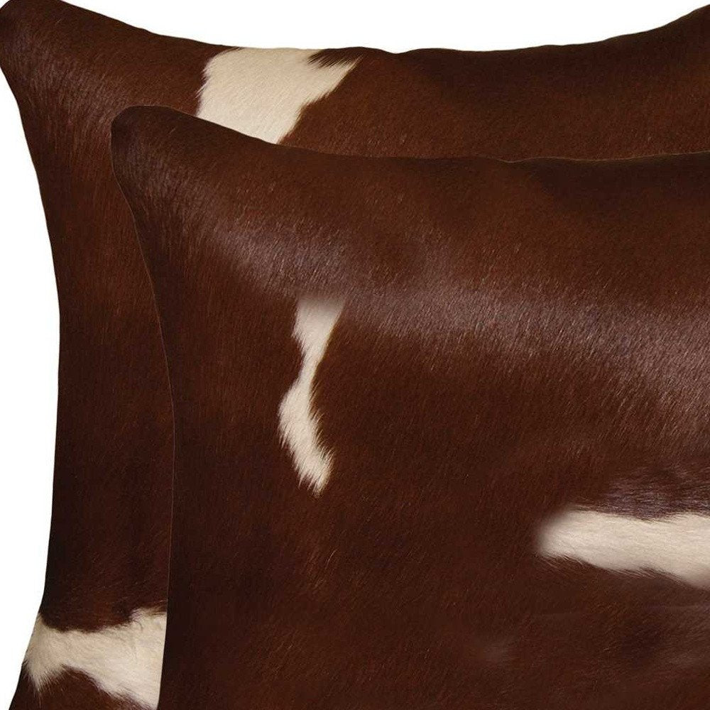 Set of Two 18" Brown And White Cowhide Throw Pillows