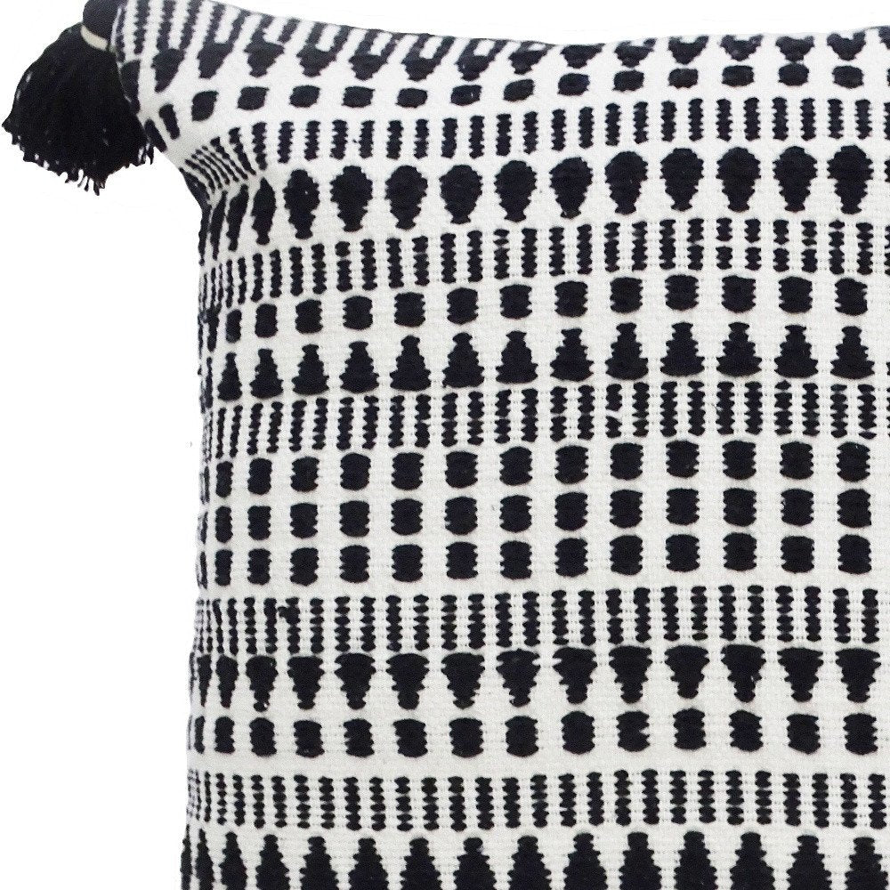 22" Black and White Southwestern Cotton Blend Throw Pillow With Tassels