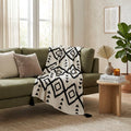 60" X 50" Black and White Woven Cotton Geometric Throw Blanket with Tassels