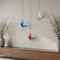 Set of Three Blue Red And White Resin Climbing Man Hanging Dimensional Sculpture