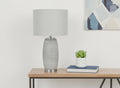 25" Gray and Silver Ceramic Cylinder Table Lamp With Gray Drum Shade