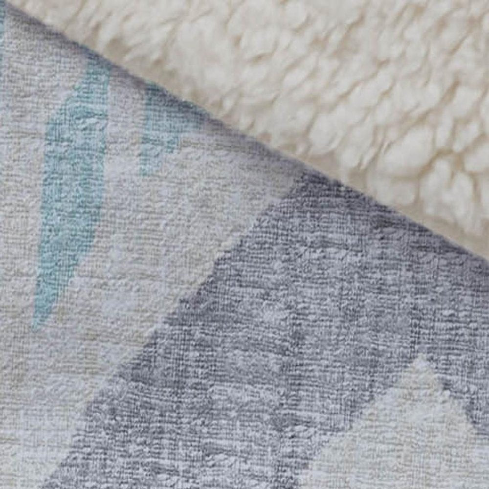 50" X 70" Aqua Gold And Ivory Microfiber Ikat Plush Throw Blanket